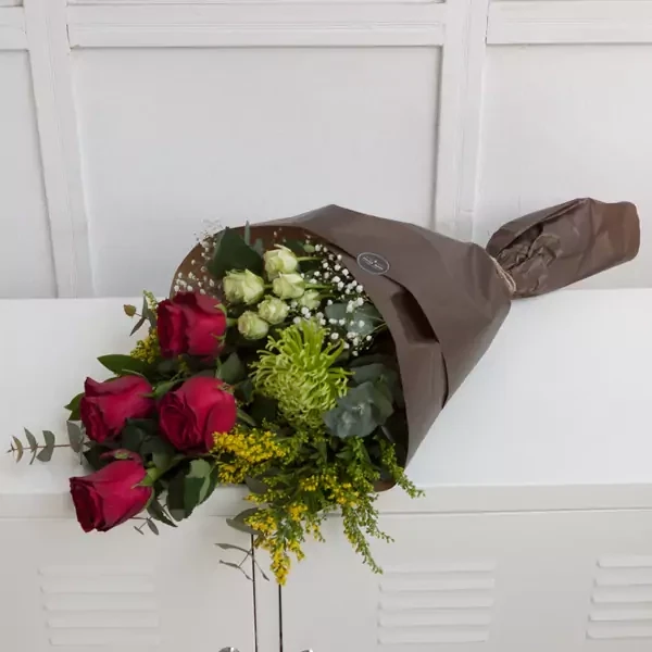 Funeral bouquet with red roses