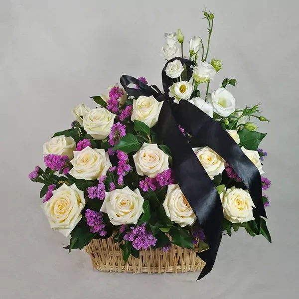 Funeral wreath in white-purple colors
