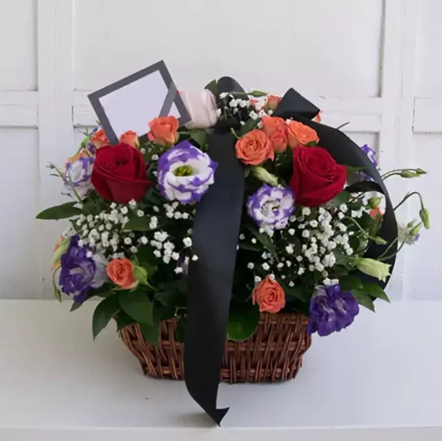Funeral basket with different flowers