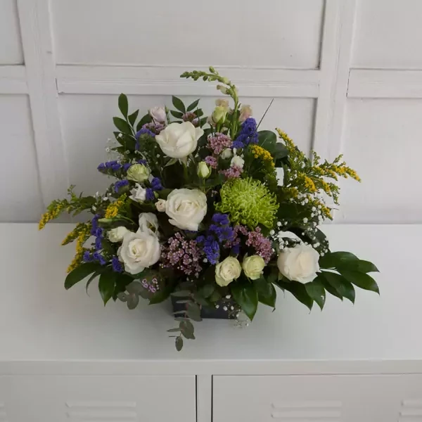 Wreath-shaped funeral bouquet in oasis