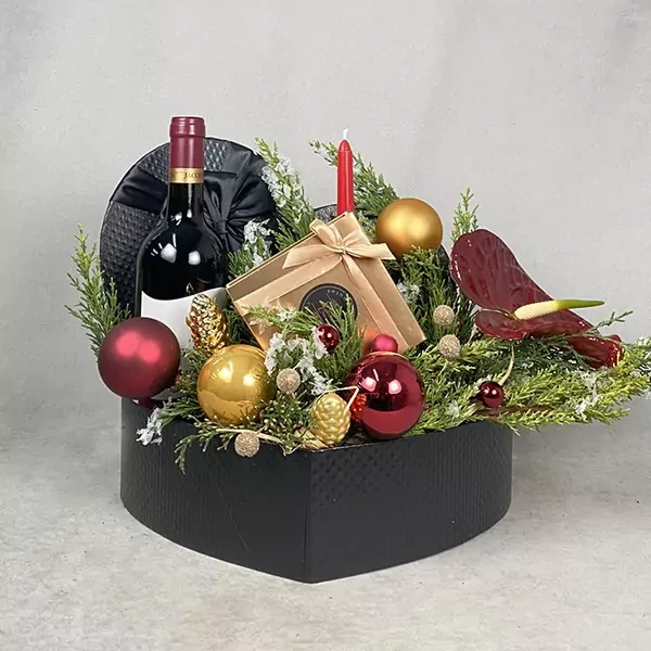 Christmas composition with anthurium and wine