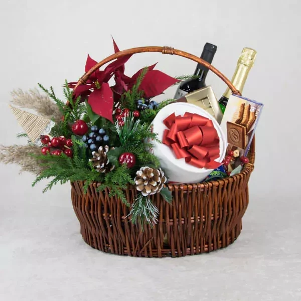 Basket with poincettia and gifts