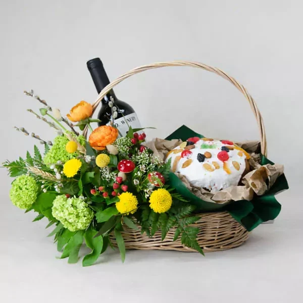 Easter basket with cake and wine