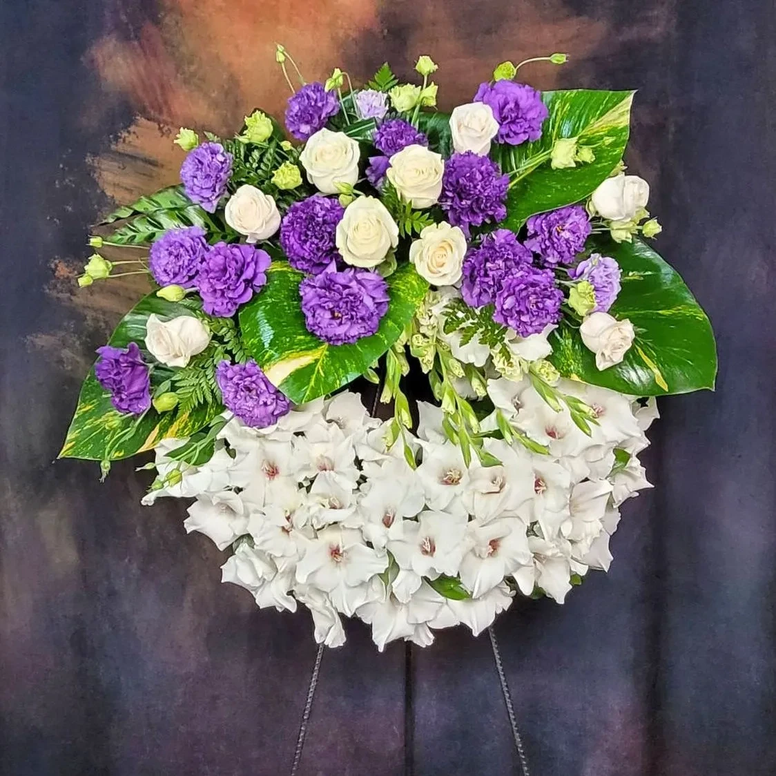 Funeral wreath in white-purple