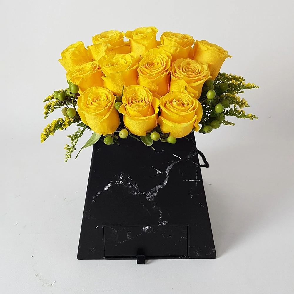 Composition with yellow roses