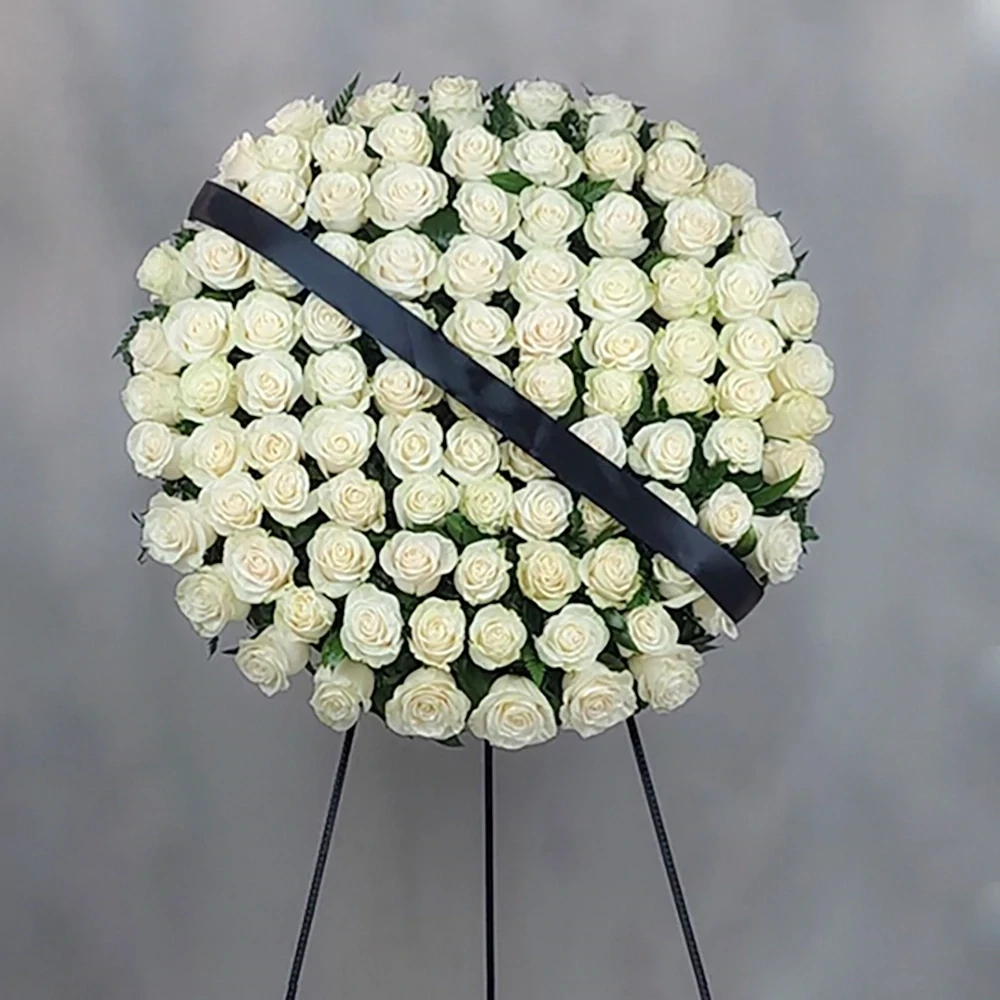 Funeral crown consists of white roses