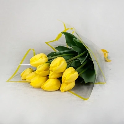 The bouquet consists of tulips of one color. The approximate size of the bouquet is 50 cm.

