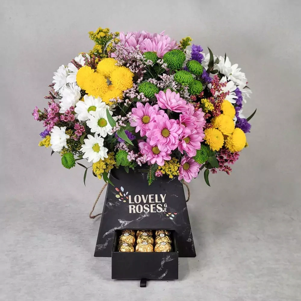 Chrysanthemums in box with Ferrero