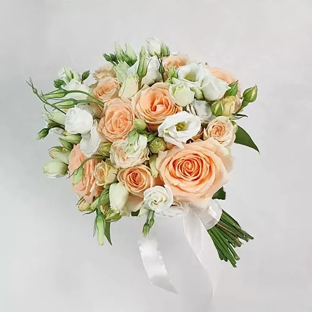 Wedding bouquet in beige and white colors