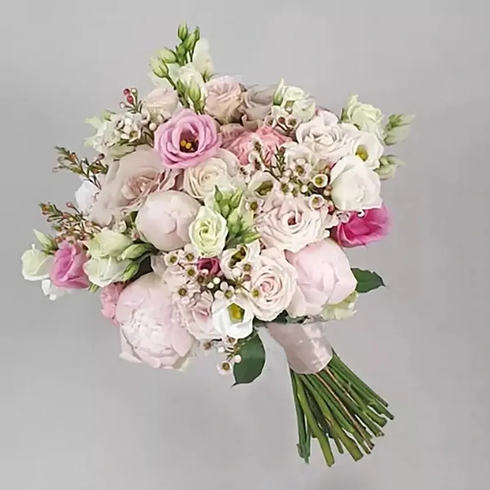 The wedding bouquet consists of pink and white flowers