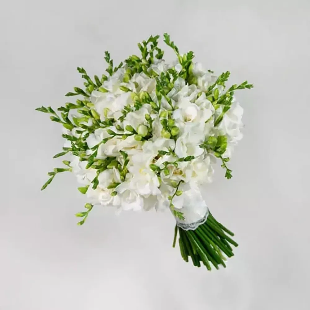 White freesias are used in the wedding bouquet