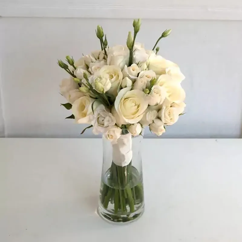 Wedding bouquet with roses and other flowers