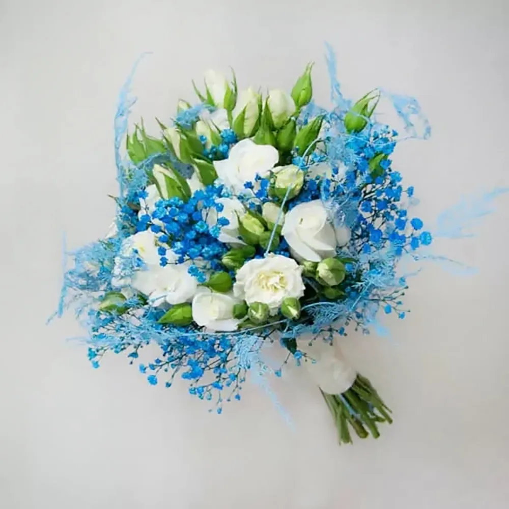 Wedding bouquet in blue and white colors