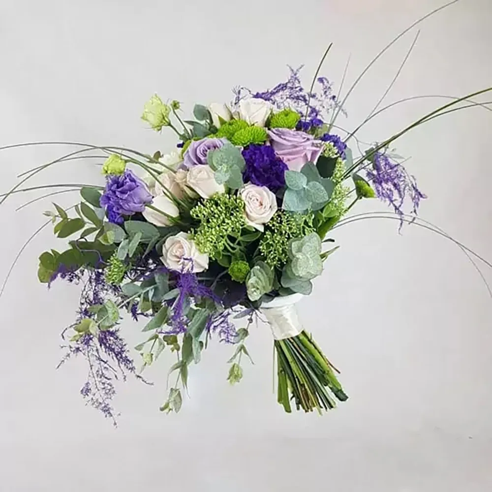 The wedding bouquet consists of purple and green flowers