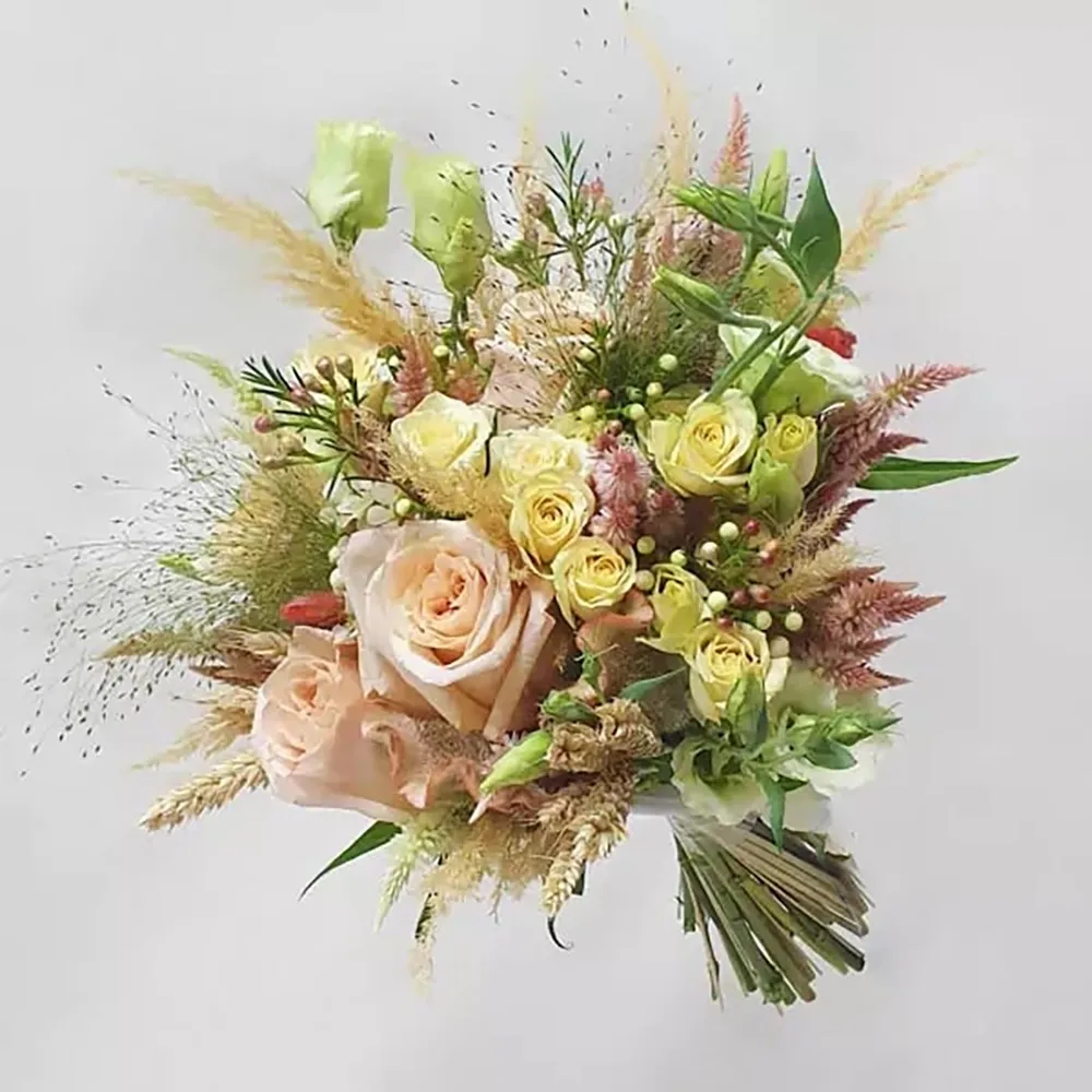 Wedding bouquet with wildflowers in a ruffled style