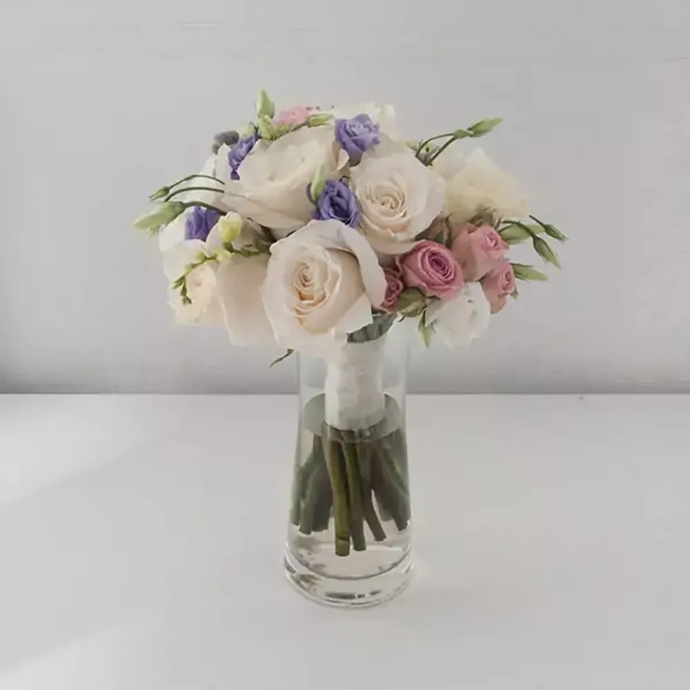 Wedding bouquet in white colors with purple details