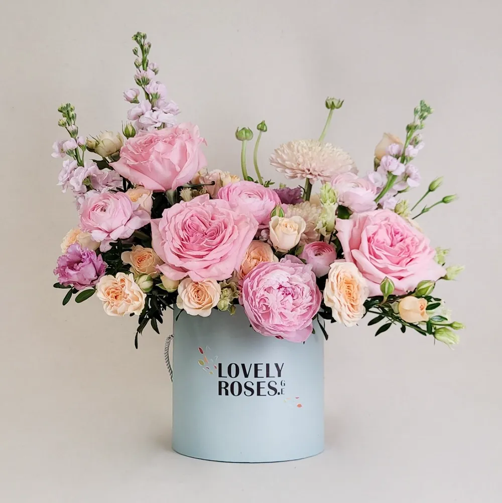 Сomposition A1 with ranunculus and peony