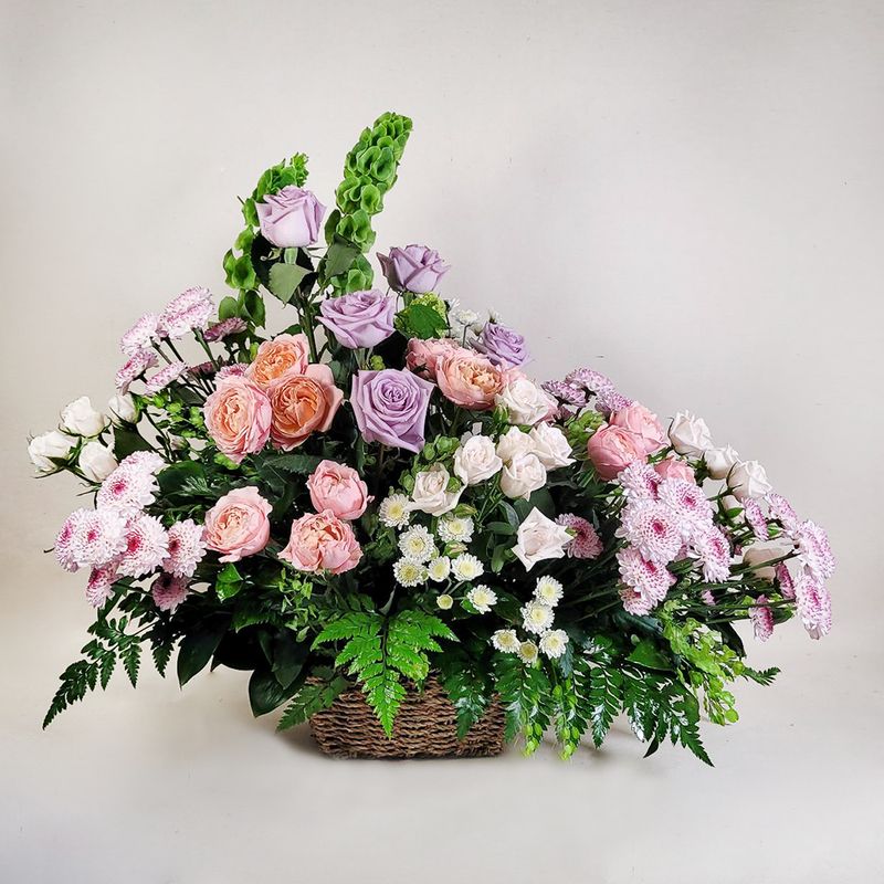 Funeral basket in pastel colors