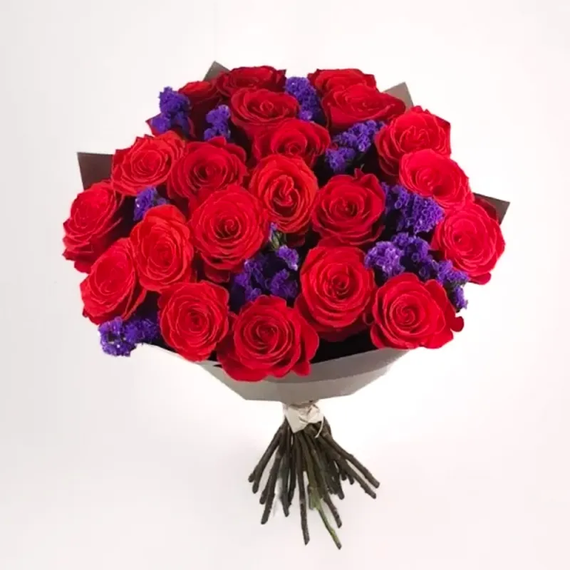 Bouquet of 21 bright red roses and statice