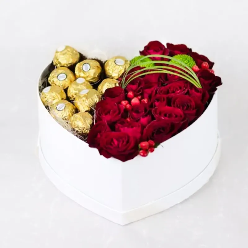 Roses and ferreros in a white box