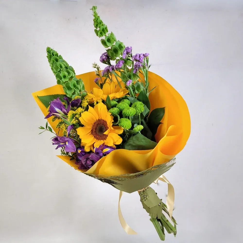 Bouquet of sunflowers in yellow and purple tones