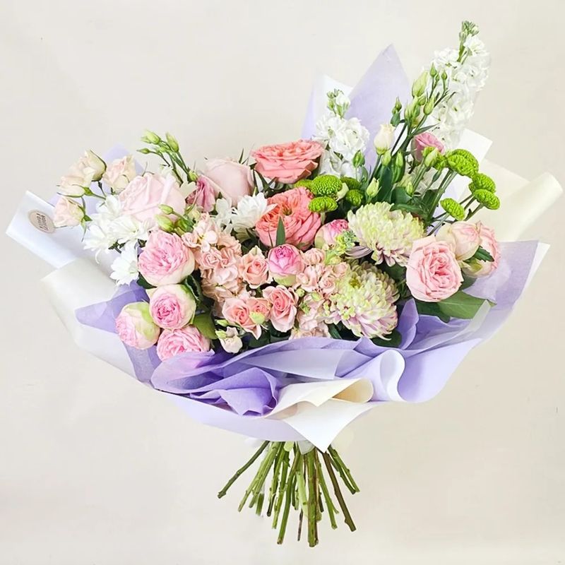 Gentle bouquet of roses and chrysanthemums