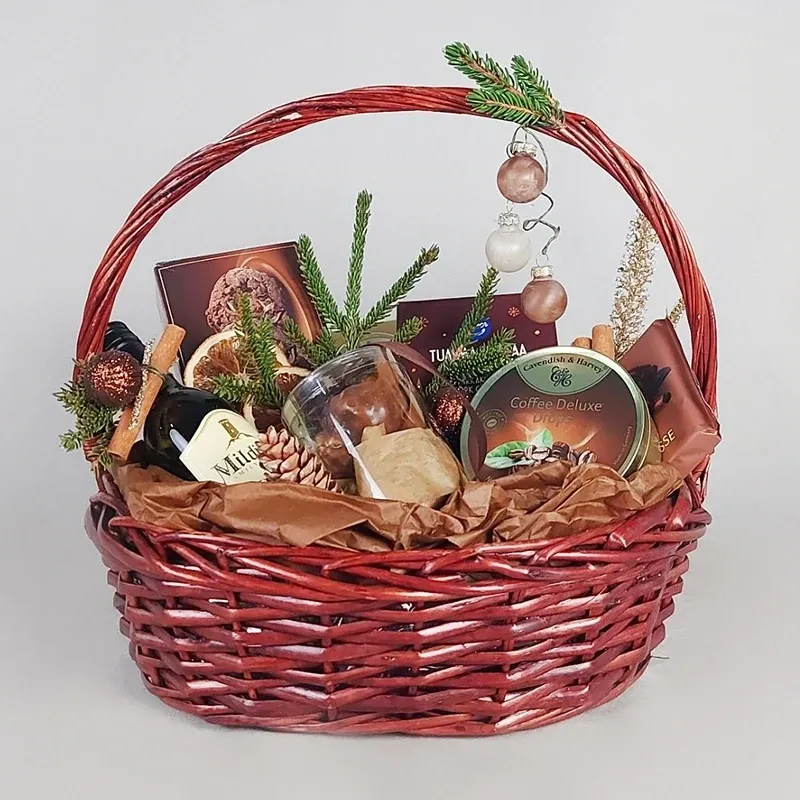Basket with wine and sweets