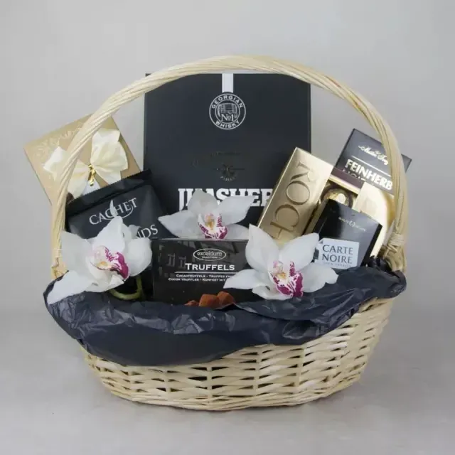 Big basket with wisky and chocolates