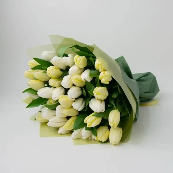 41 tulips in light tones are used in the bouquet.

