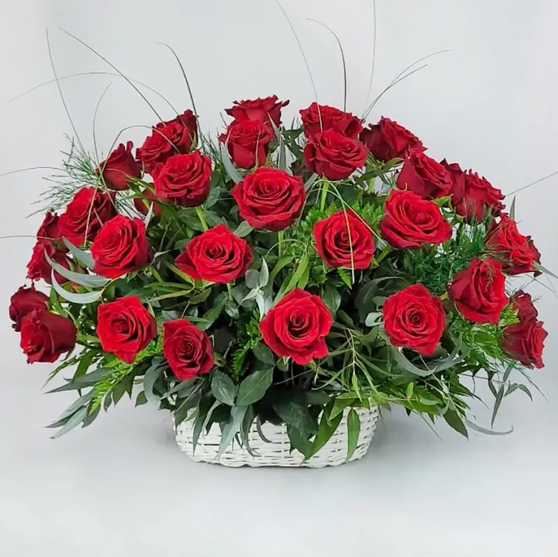 50 red roses' arrangement in a basket