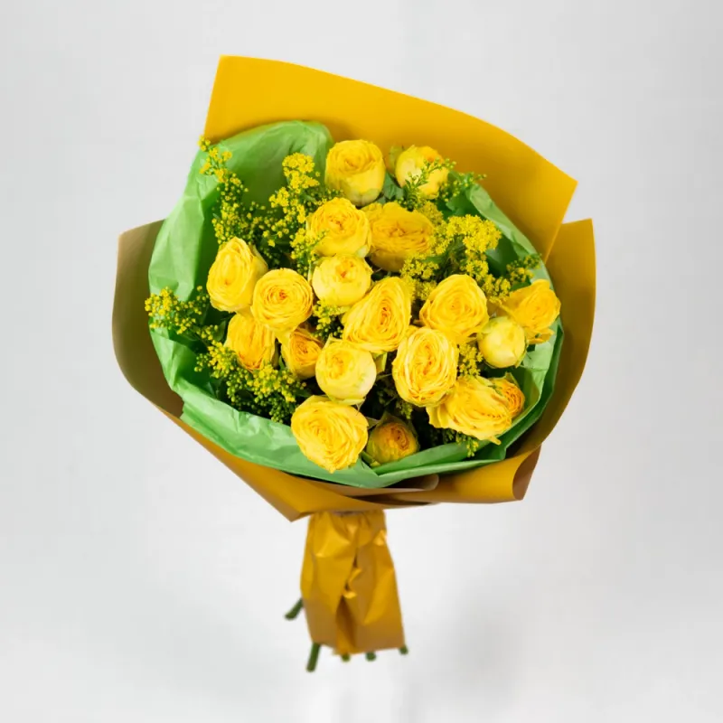 Bouquet with yellow spray roses and solidago
