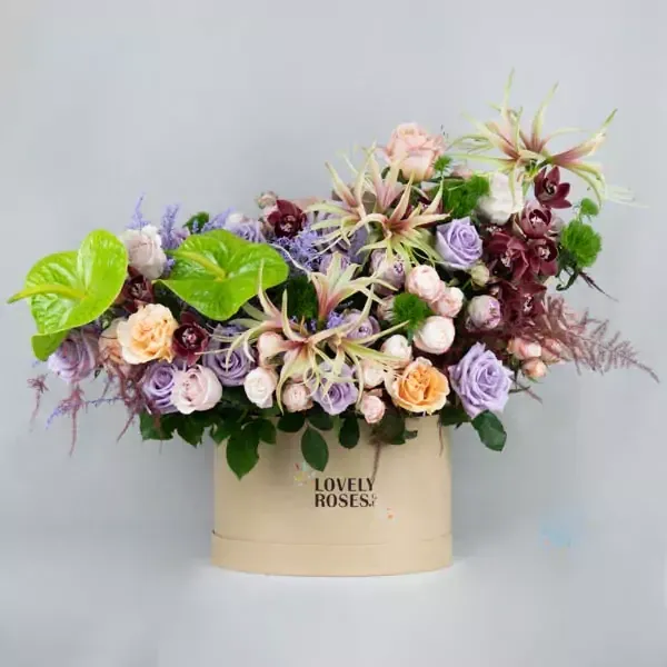 Composition with amaryllis and orchids