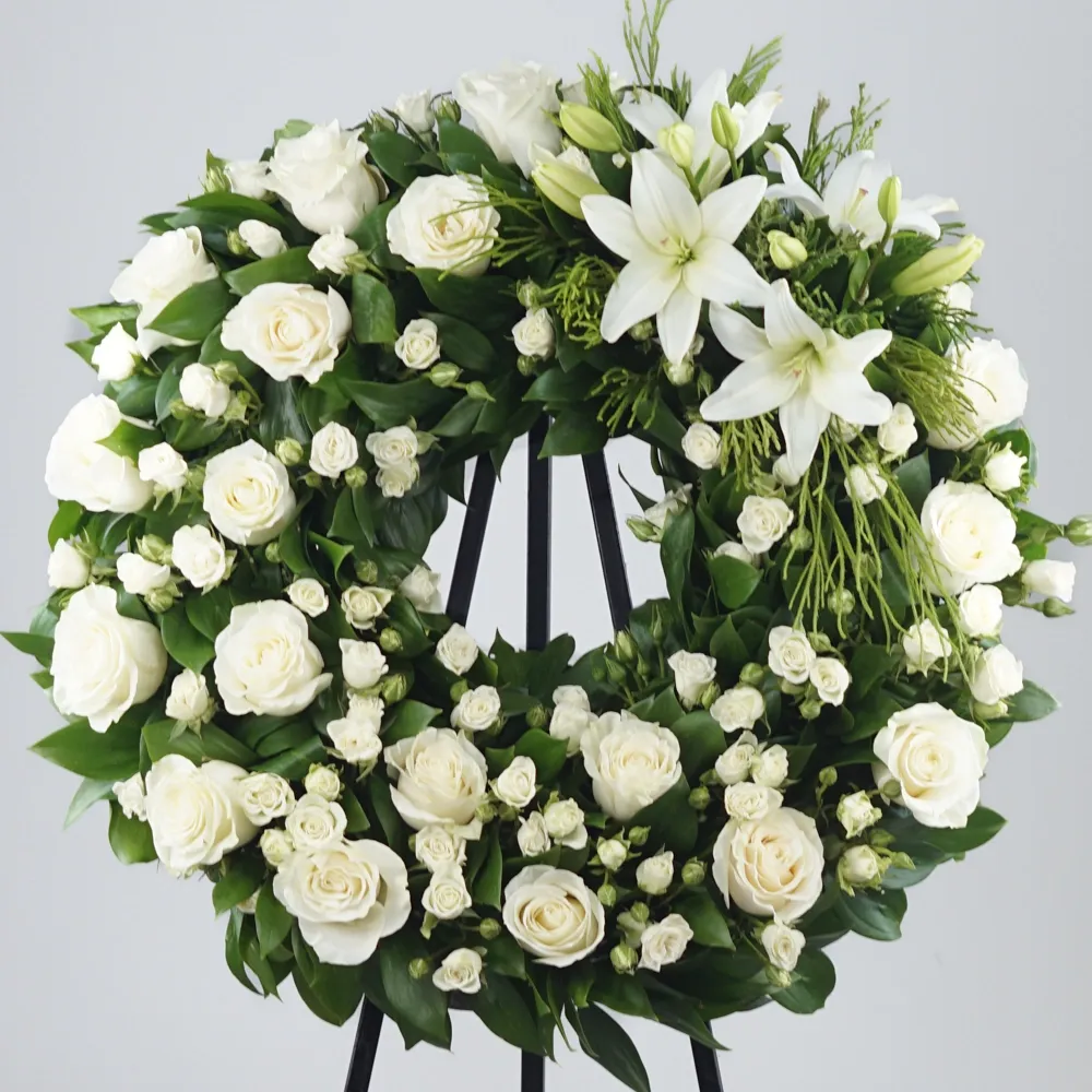 Funeral wreath with white lilies