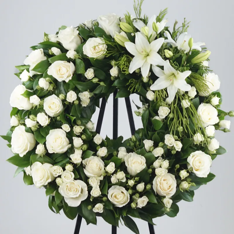 Funeral wreath with white lilies