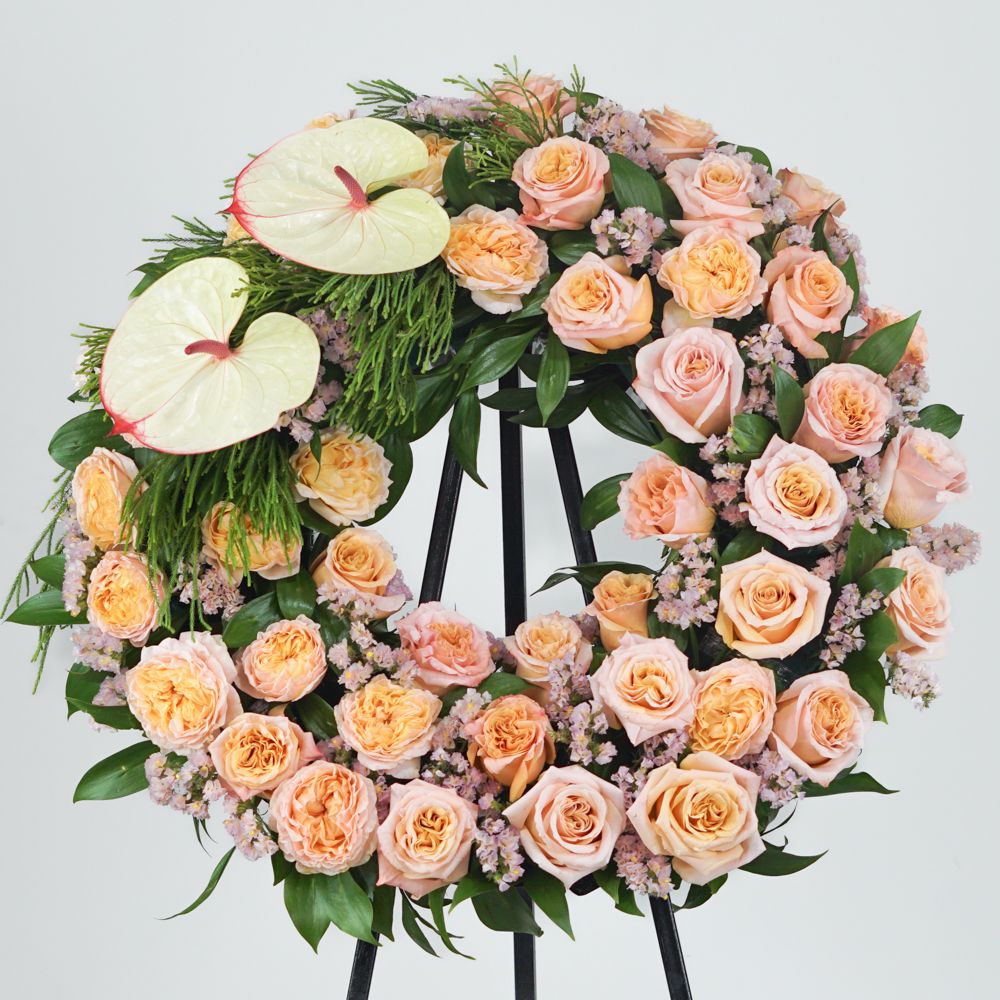 Funeral wreath in In peach colors