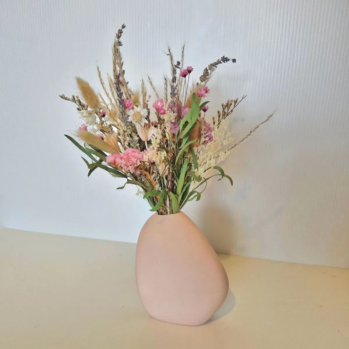 Gemini dried floral arrangement in soft pink vase, a timeless piece to elevate any home or office space.