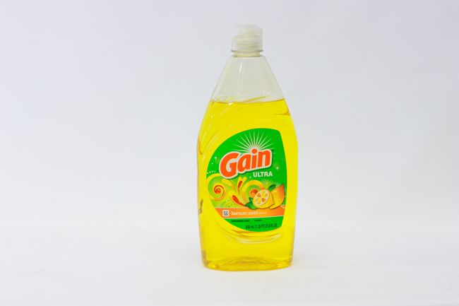 GAIN ULTRA  ANTIB. LEMON ZEST DISHWASHING LIQUID 21.6OZ..