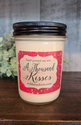 A 1000 KISSES CANDLE