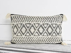 NATURAL AND BLACK DIAMOND TASSEL PILLOW 12X20&quot;
