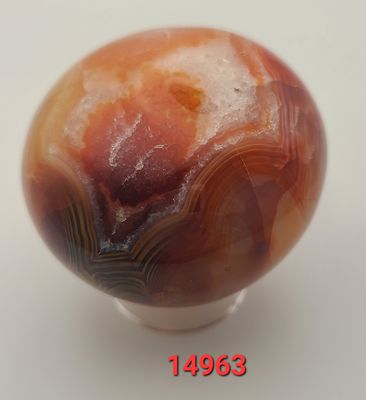 272 GRAM CARNELIAN SPHERE ON ACRYLIC STAND