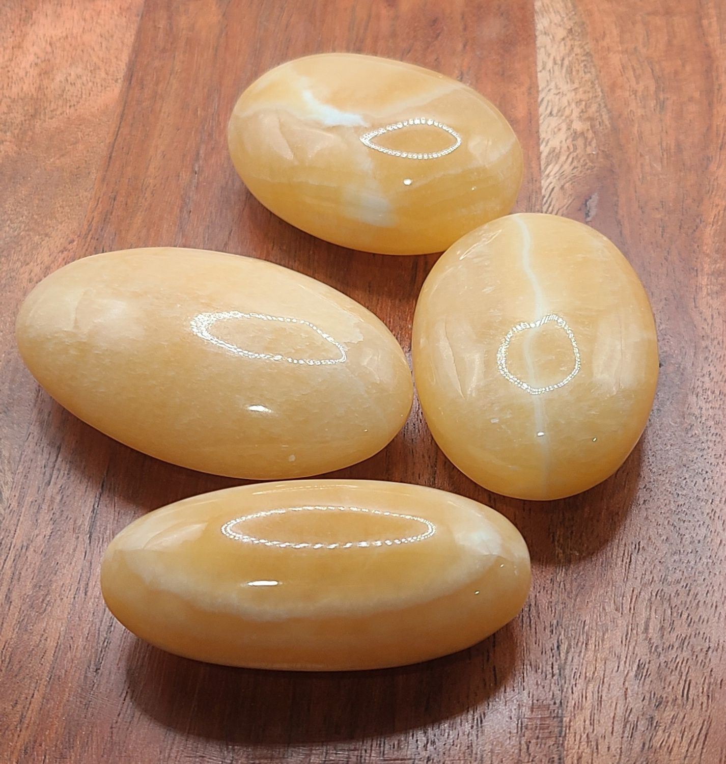 ASSORTED ORANGE CALCITE WORRY STONE