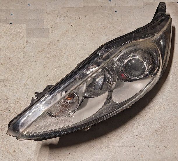 Fanale anteriore sinistro 8A61-13W030-CF FORD FIESTA 1.4 Tdi (2009-2014) interno cromato Fanale anteriore sinistro 8A61-13W030-CF FORD FIESTA 1.4 Tdi (2009-2014) interno cromato