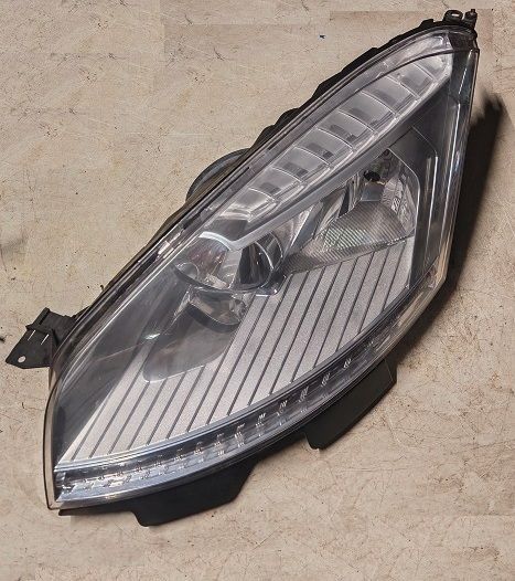 Fanale anteriore sinistro 9673099980 CITROEN C4 PICASSO (2009-2013) freccia trasparente Fanale anteriore sinistro 9673099980 CITROEN C4 PICASSO (2009-2013) freccia trasparente