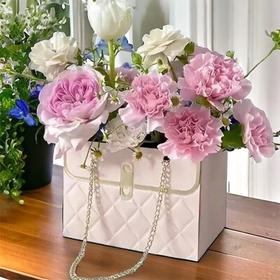 Floral Arrangement Bag and a Box of Chocolates Bundle