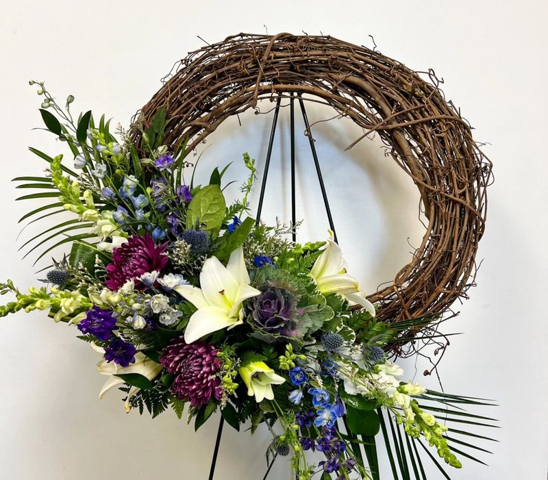 Rustic grapevine wreath standing spray