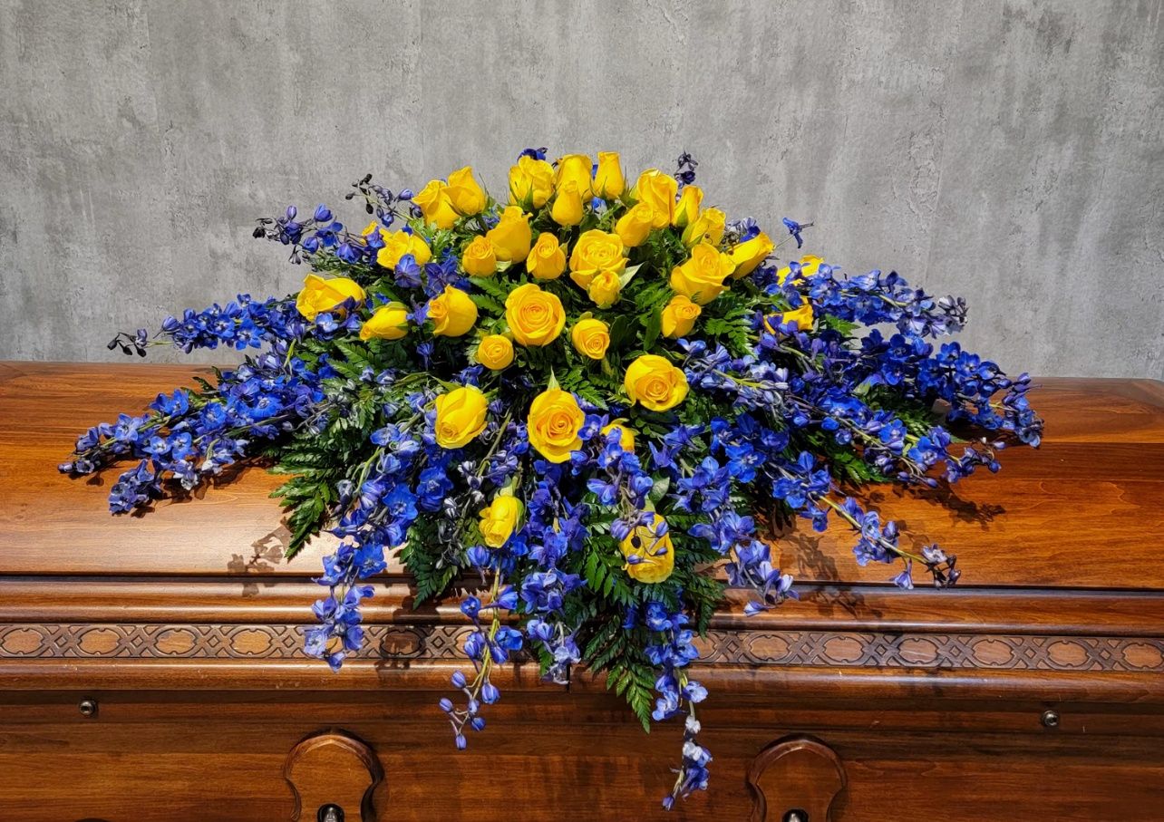 Yellow and Blue Casket Spray
