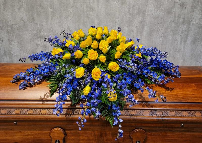 Yellow and Blue Casket Spray