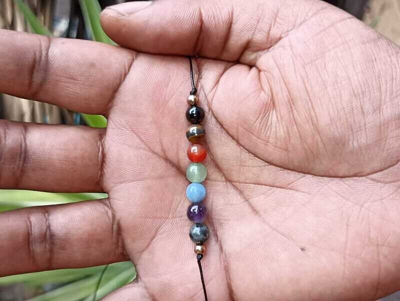 7 Chakra balancing adjustable string bracelet