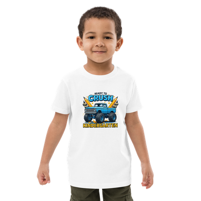 Young boy wearing a white “Ready to Crush Kindergarten” monster truck T-shirt for back-to-school.