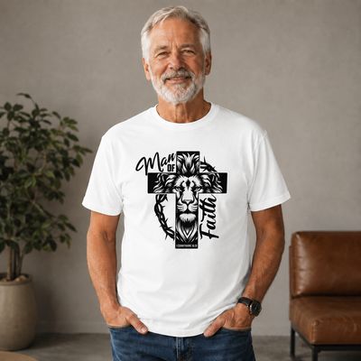 Older white man wearing a white Man of Faith Christian T-shirt featuring a lion, cross, and Bible verse.